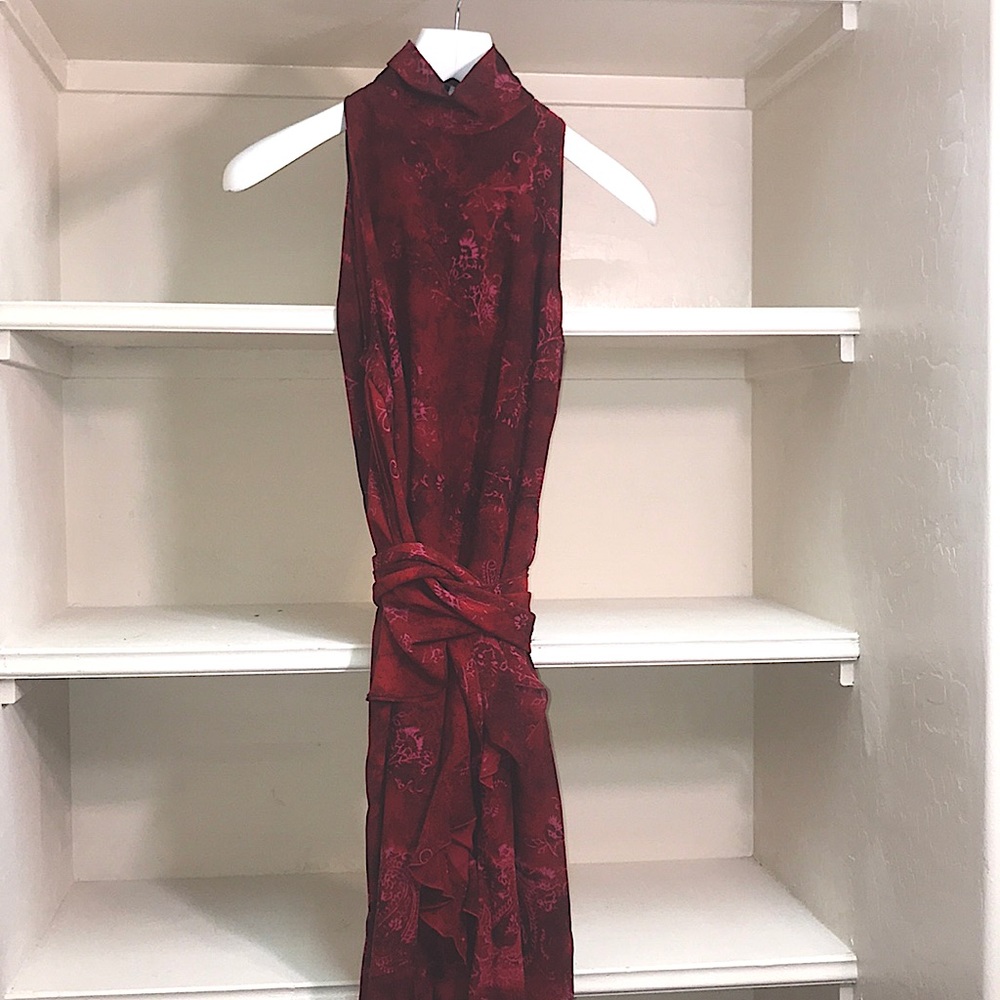 A warped dress with fabric belt to wrap around it